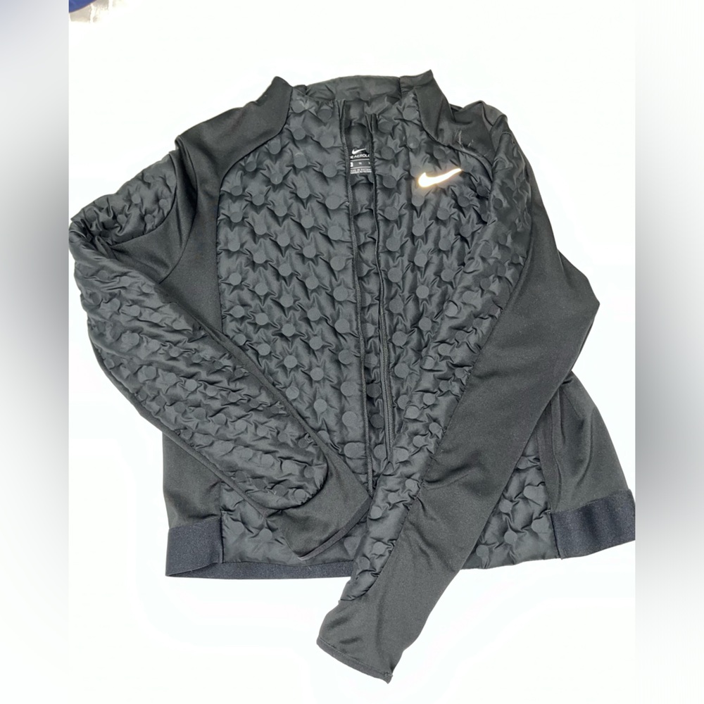 Black spring jacket size XL. But fits like a size L